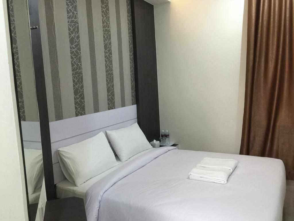 Redlink Hotel Batam Chambre photo